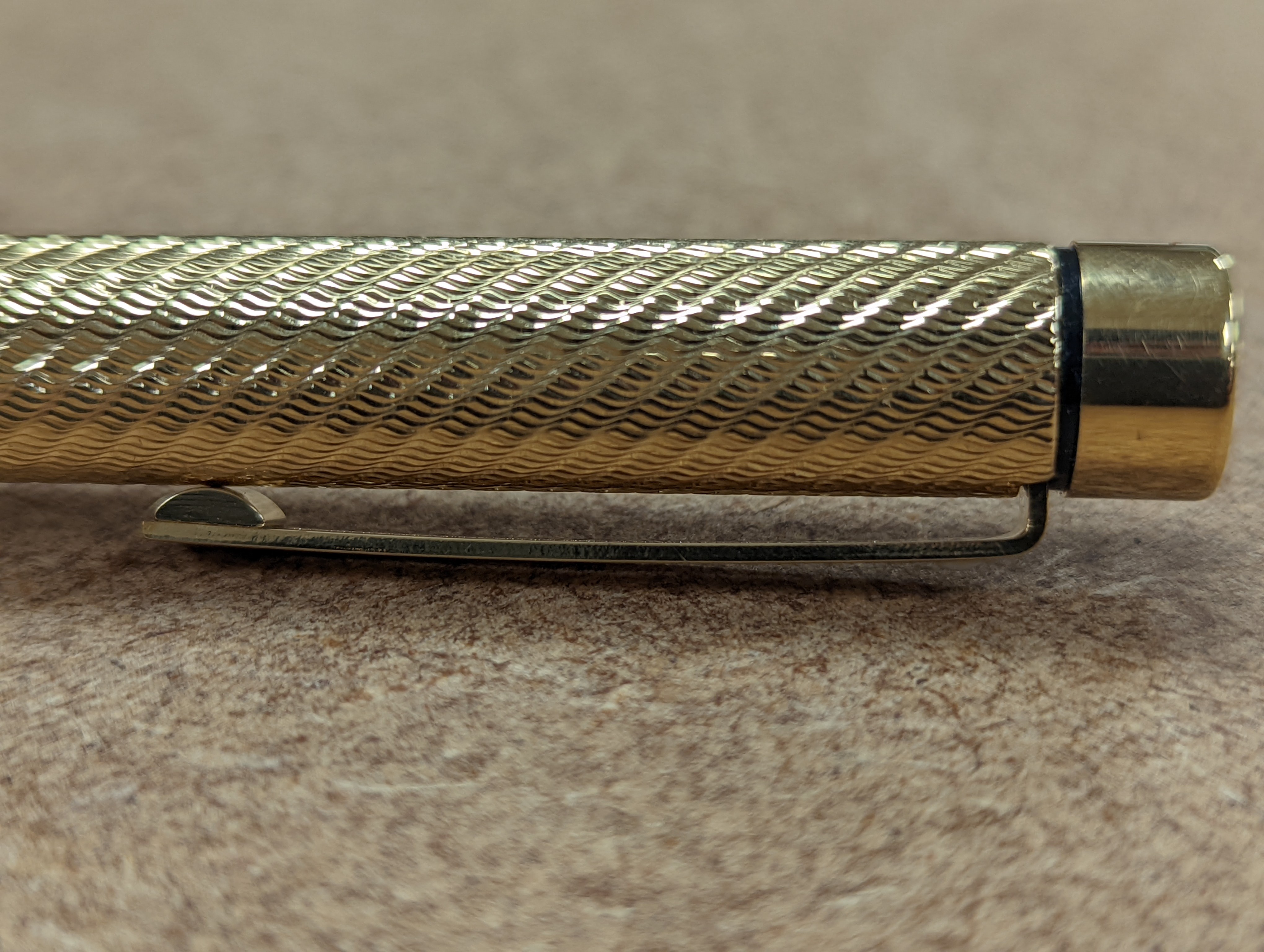 A cased gold plated Shaeffer fountain pen.